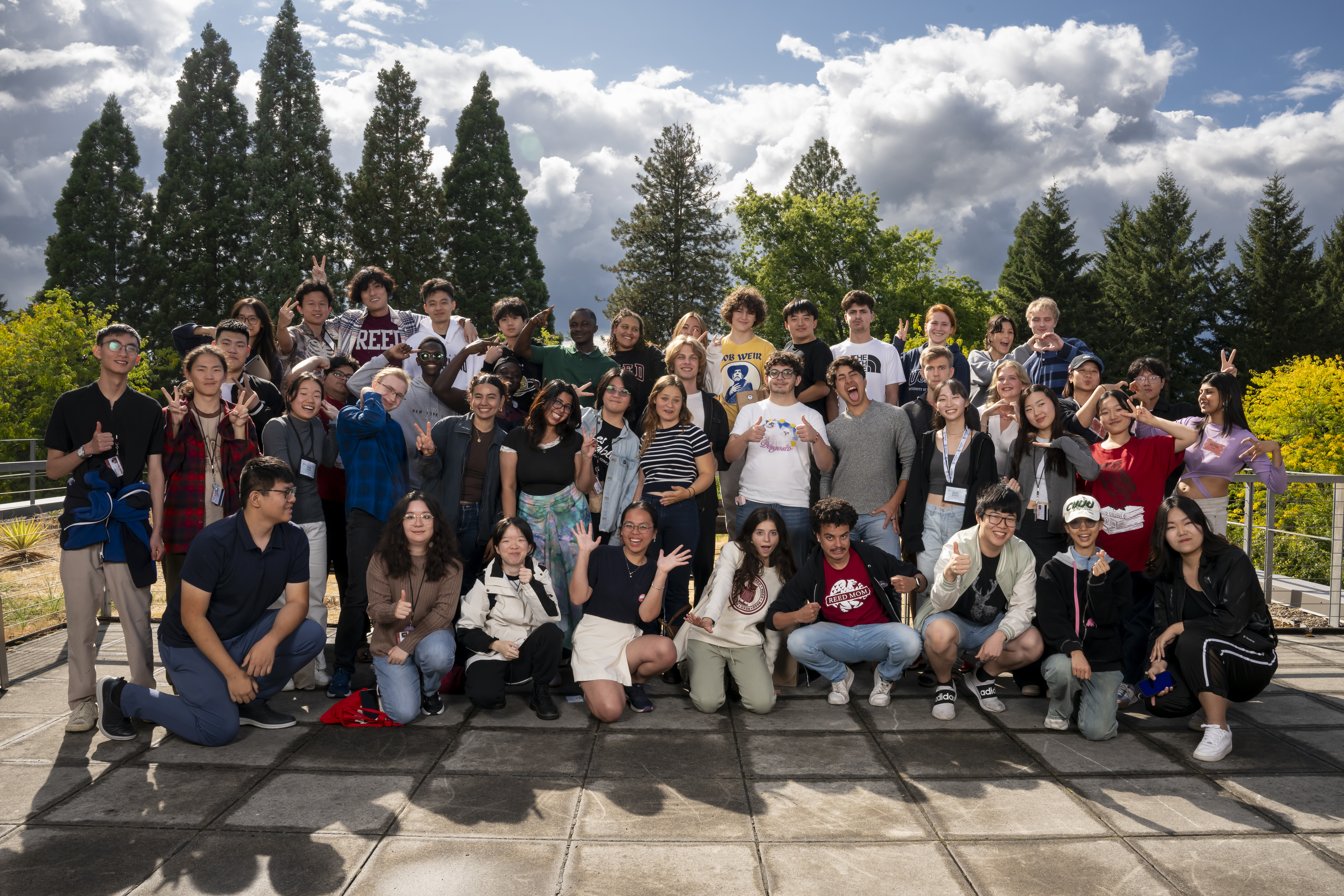 large group of international students assembled for a formal group photo